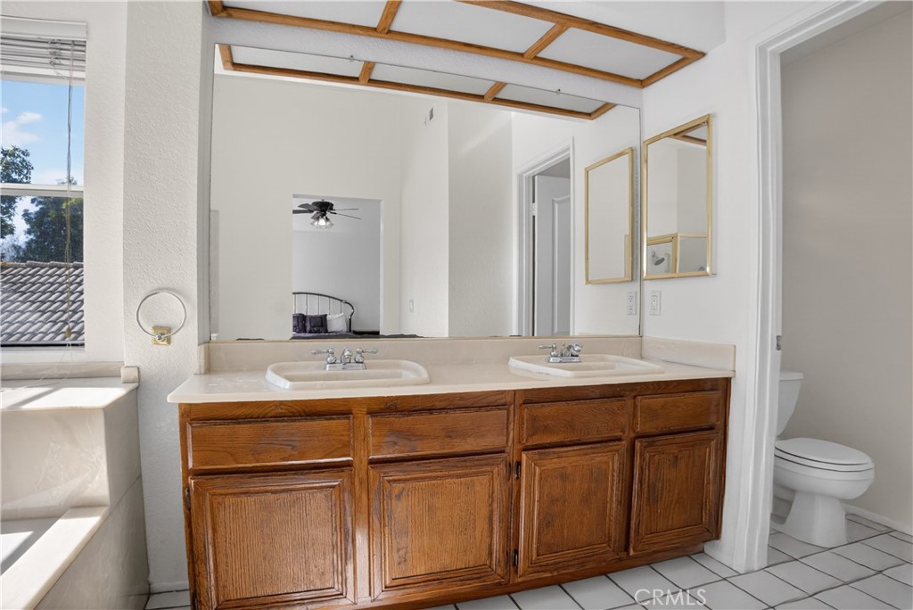 540 Fairfield Road Simi Valley, CA 93065 - Photo 40 of 47 a bathroom with a sink toilet vanity and shower