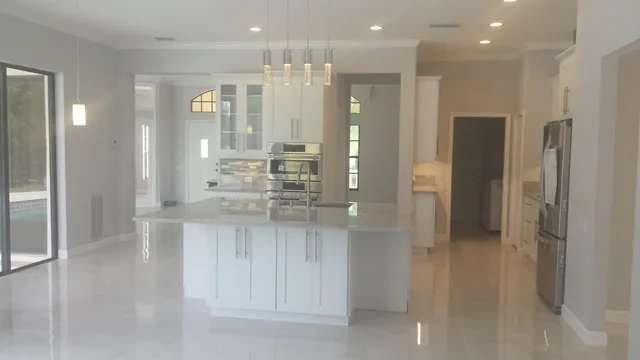 a bathroom with a glass shower door and a bathtub