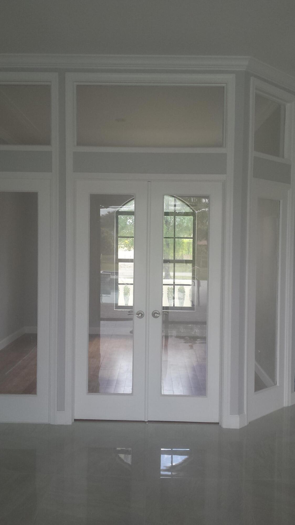 8709 Man O War Road Palm Beach Gardens, FL 33418 - Photo 10 of 27 a view of front door