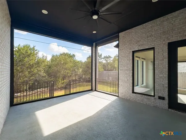 a view of an empty room with a balcony