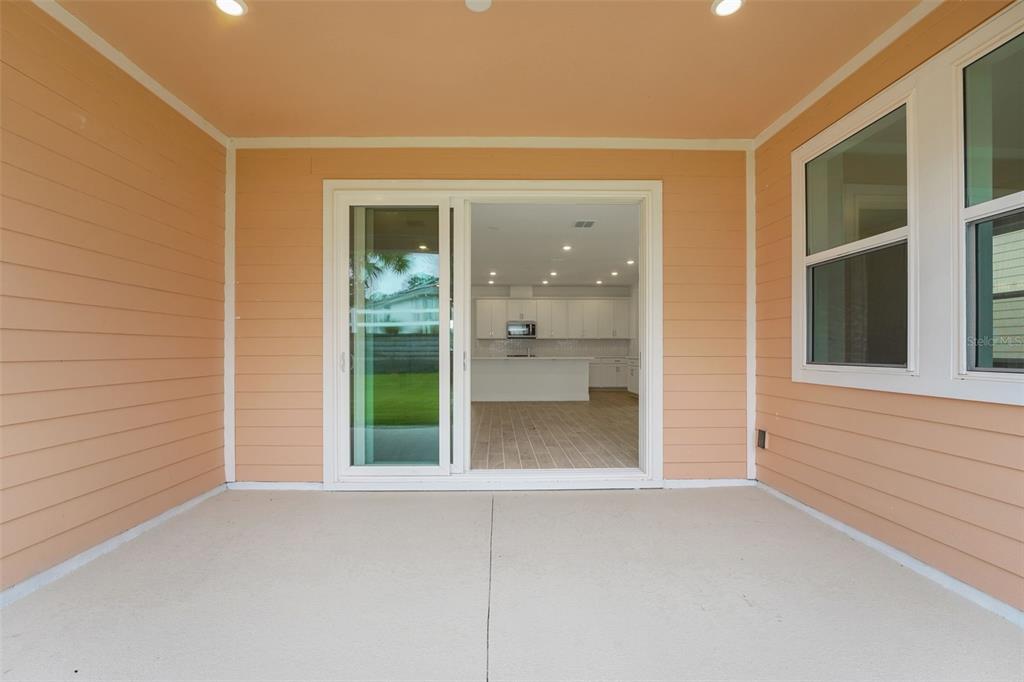 987 Fiesta Key Circle Lady Lake, FL 32159 - Photo 9 of 39 a view of an empty room with a window