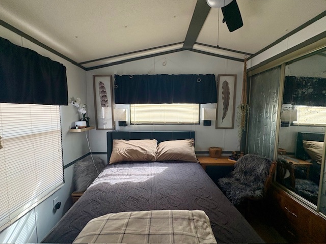 27-34 Woodhaven Sublette, IL 61367 - Photo 14 of 17 a bedroom with a large bed and a large window