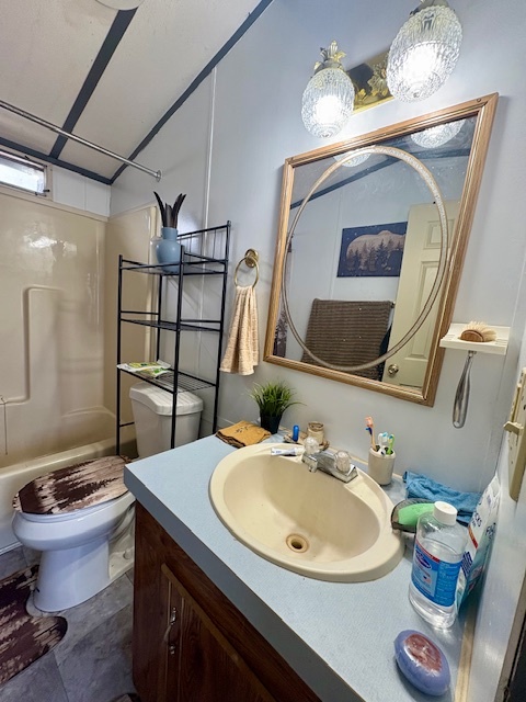 27-34 Woodhaven Sublette, IL 61367 - Photo 17 of 17 a bathroom with a toilet sink and mirror