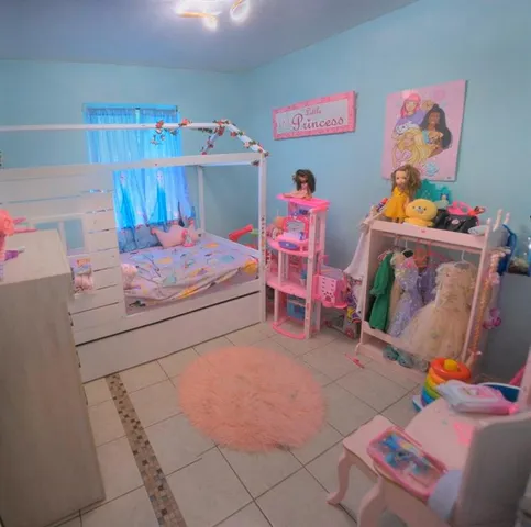 a bedroom with a bed and cabinets