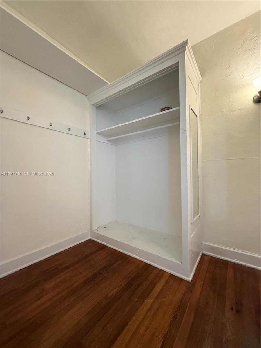 1361 Meridian Avenue, Unit 4 Miami Beach, FL 33139 - Photo 14 of 14 a view of an empty room with wooden floor