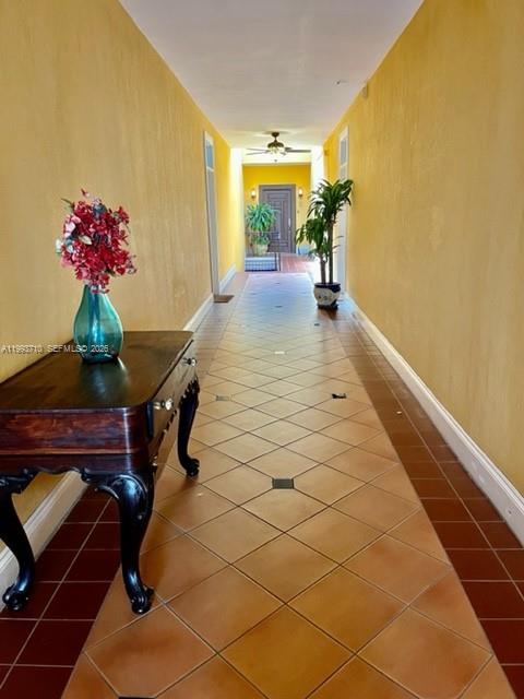1361 Meridian Avenue, Unit 4 Miami Beach, FL 33139 - Photo 9 of 14 a lobby with furniture and flowers