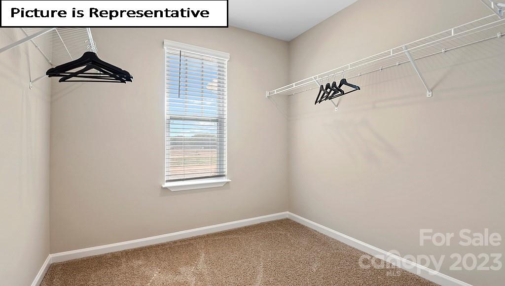 7113 North Mill Road Charlotte, NC 28216 - Photo 20 of 26 a view of an empty room and a window