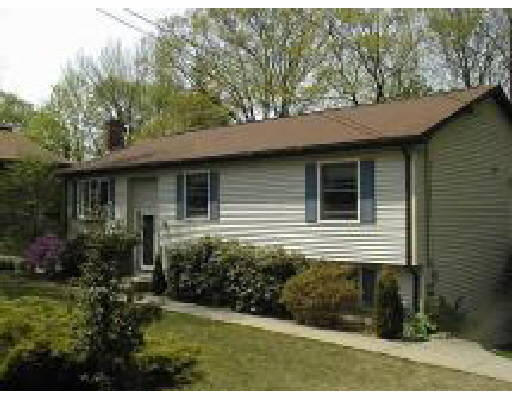 148 Hampton Street Auburn, MA 01501 - Photo 1 of 1 a view of a house with a yard