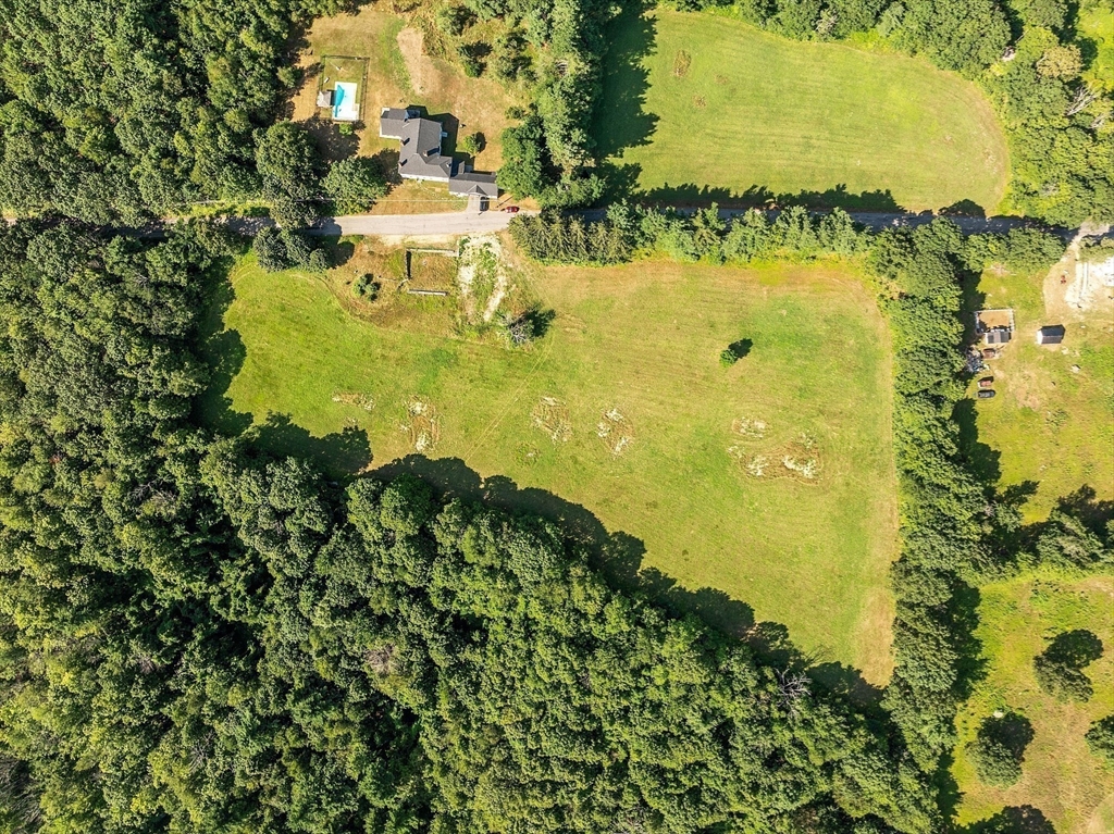 Lot 6 Old Northfield Road Ashby, MA 01431 - Photo 9 of 18 a view of a lake with a houses