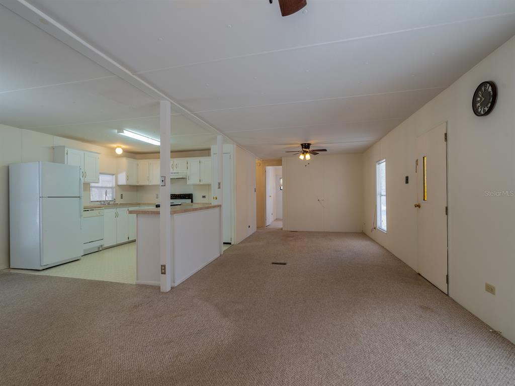 24797 Northeast 135th Street Salt Springs, FL 32134 - Photo 18 of 61 a view of a kitchen with a sink and cabinets