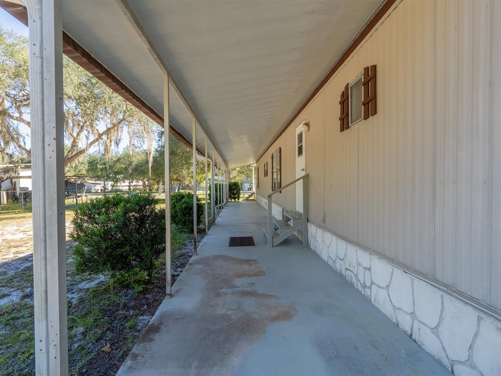 24797 Northeast 135th Street Salt Springs, FL 32134 - Photo 42 of 61 a view of a porch