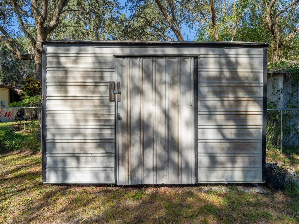 24797 Northeast 135th Street Salt Springs, FL 32134 - Photo 47 of 61 a view of outdoor space with fountain