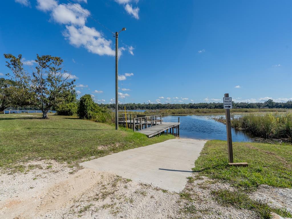 24797 Northeast 135th Street Salt Springs, FL 32134 - Photo 51 of 61 a view of a lake with a big yard