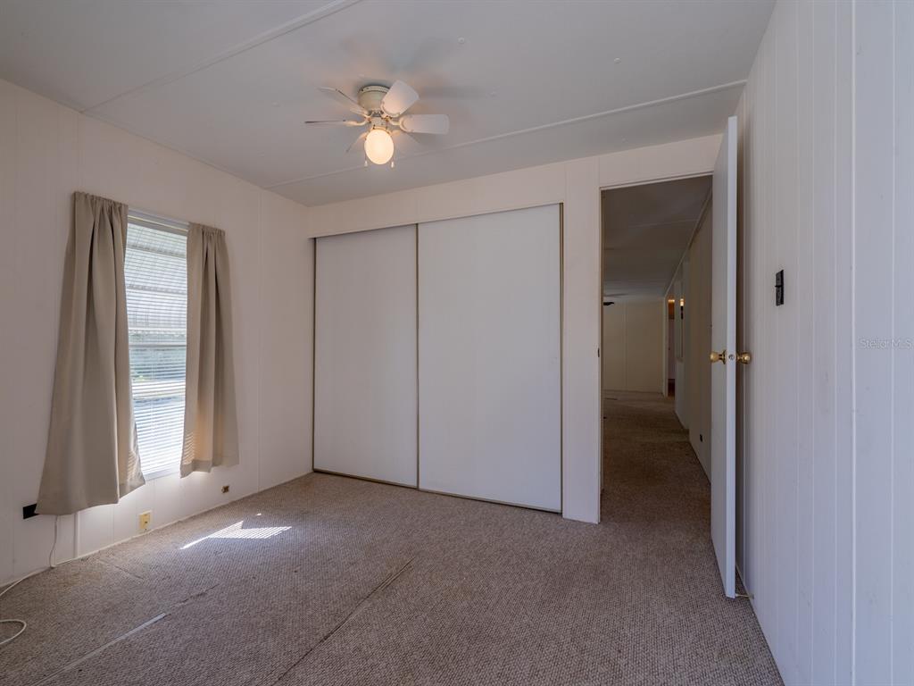 24797 Northeast 135th Street Salt Springs, FL 32134 - Photo 10 of 61 a view of empty room with window