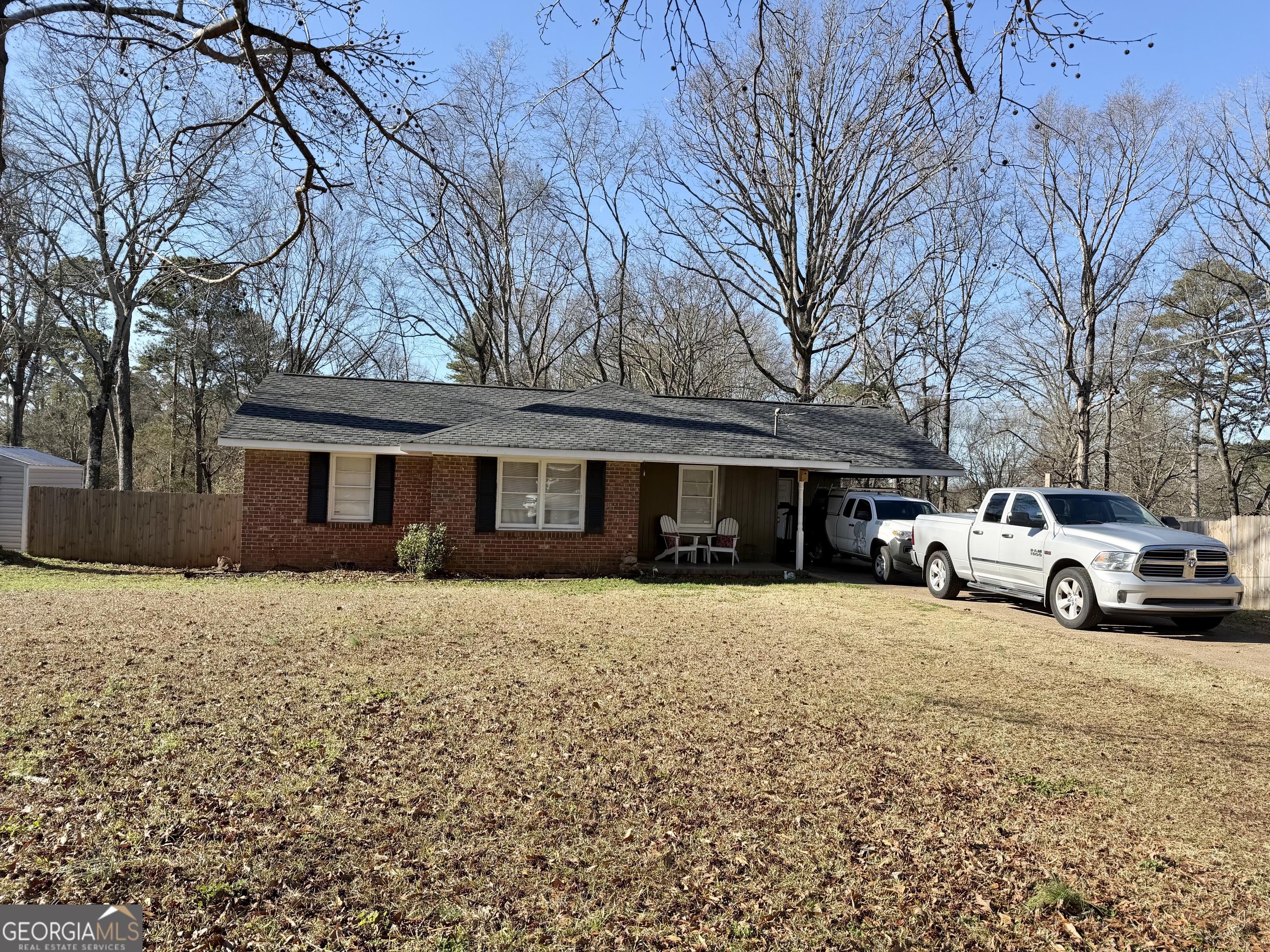 2009 Euclid Street Statham, GA 30666 - Photo 3 of 14 a view of a house with a yard covered in snow