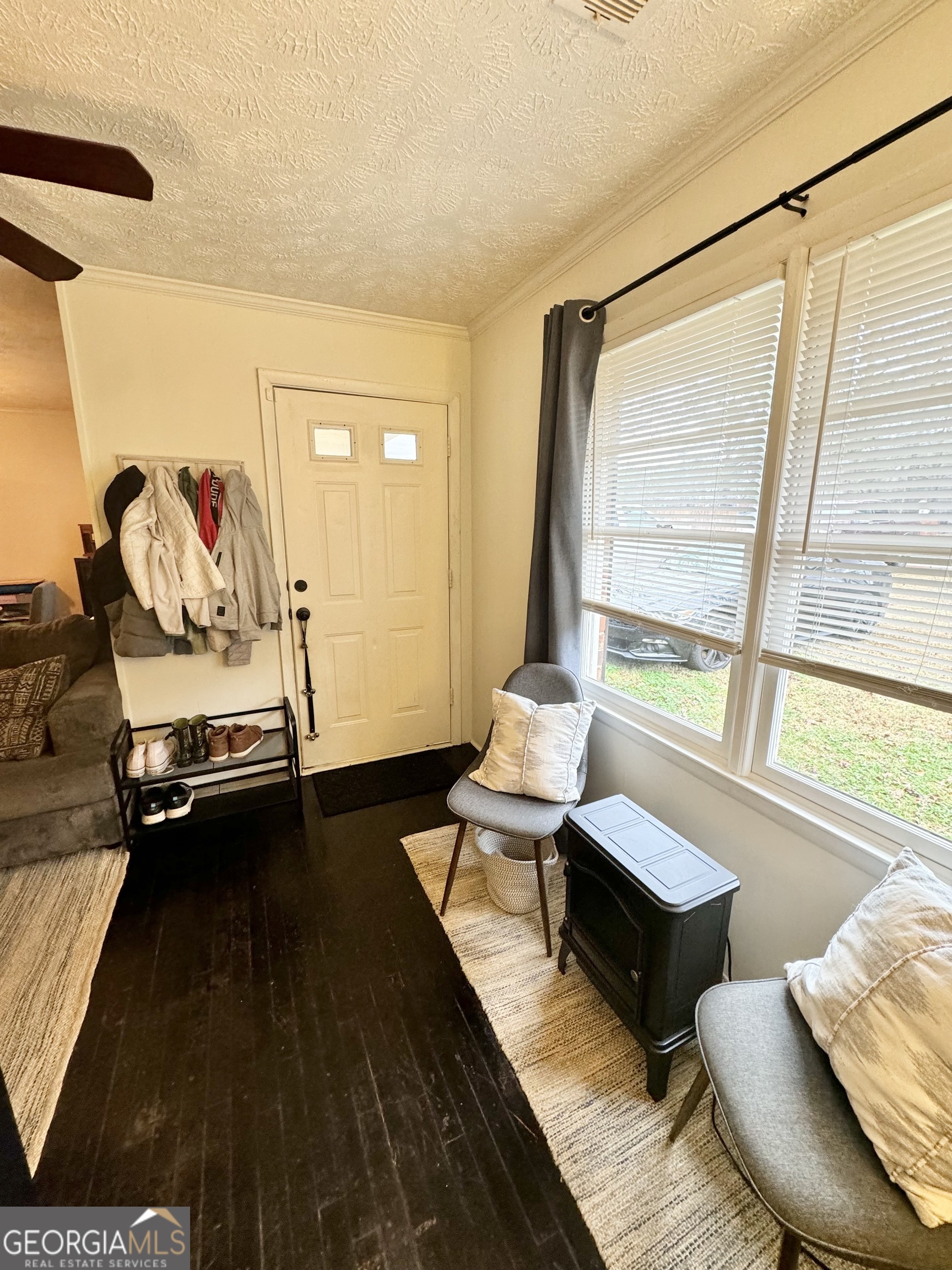 2009 Euclid Street Statham, GA 30666 - Photo 4 of 14 a living room with furniture and a window