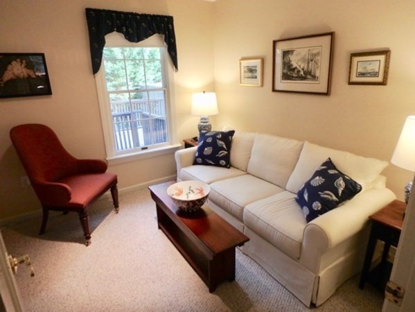 100 Connie's Way Tisbury, MA 02568 - Photo 13 of 34 a living room with furniture and a large window