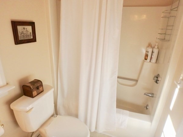 100 Connie's Way Tisbury, MA 02568 - Photo 26 of 34 a bathroom with a toilet and a shower