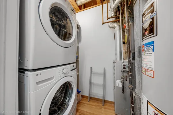 a view of a balcony with wooden floor and iron stairs