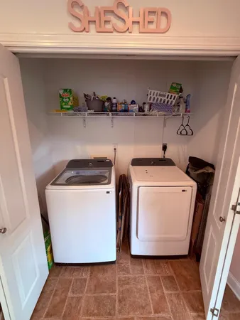 a utility room with a washer and dryer