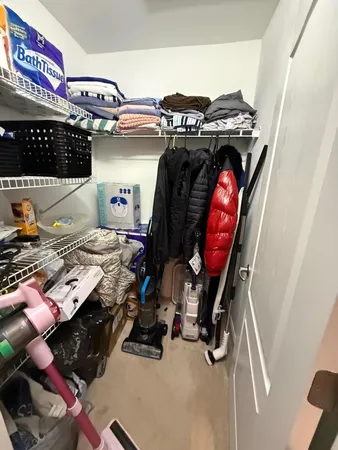 a view of a hallway with a livingroom