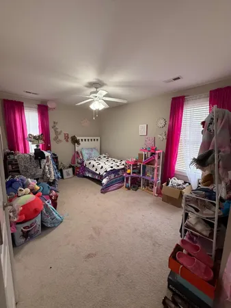 a view of a closet with storage