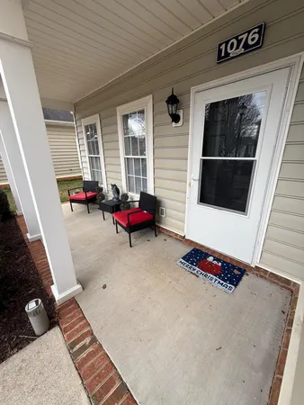 a living room with a couch and a table
