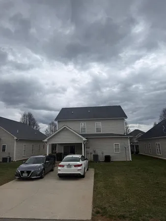 a car parked in front of a house