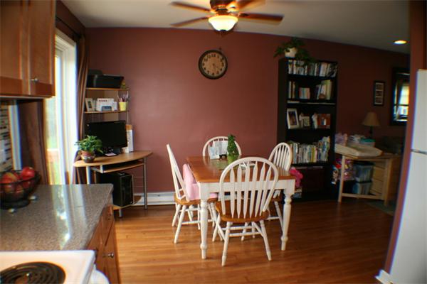 1 Fawn Ridge, Unit 1 Brookfield, CT 06804 - Photo 12 of 23 a view of a dining room with furniture and wooden floor