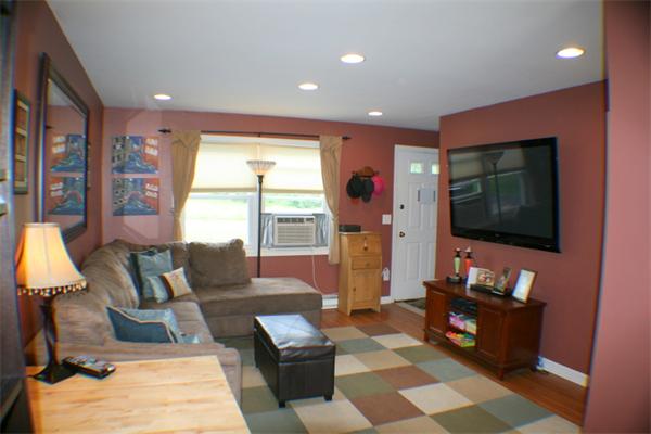 1 Fawn Ridge, Unit 1 Brookfield, CT 06804 - Photo 13 of 23 a living room with furniture and a flat screen tv