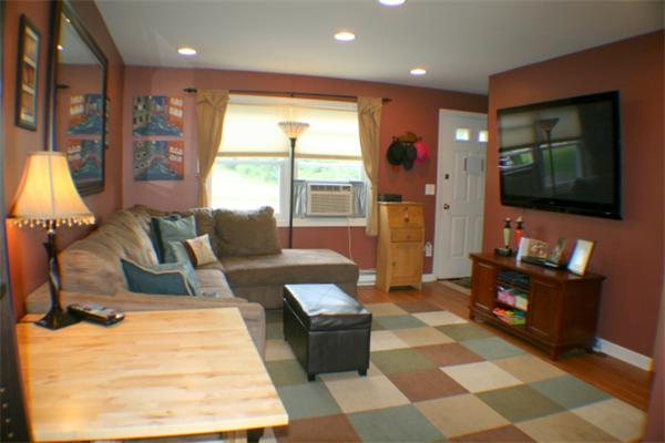 1 Fawn Ridge, Unit 1 Brookfield, CT 06804 - Photo 15 of 23 a living room with furniture and a flat screen tv
