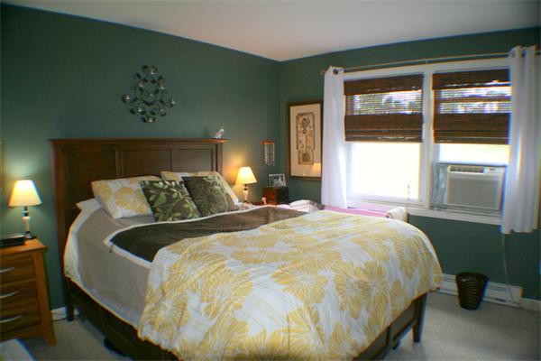 1 Fawn Ridge, Unit 1 Brookfield, CT 06804 - Photo 17 of 23 a bed sitting in a bedroom next to a window