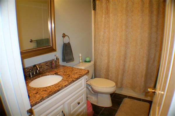1 Fawn Ridge, Unit 1 Brookfield, CT 06804 - Photo 18 of 23 a bathroom with a sink and a mirror