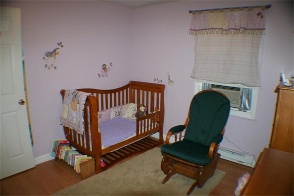 1 Fawn Ridge, Unit 1 Brookfield, CT 06804 - Photo 19 of 23 a living room with furniture and a chair