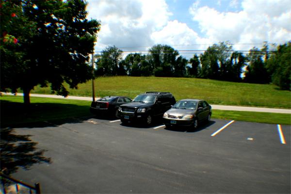 1 Fawn Ridge, Unit 1 Brookfield, CT 06804 - Photo 2 of 23 a car parked in the middle of a park
