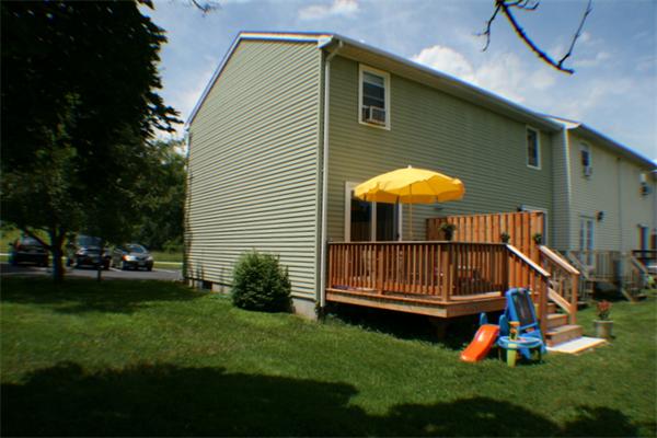 1 Fawn Ridge, Unit 1 Brookfield, CT 06804 - Photo 3 of 23 a backyard of a house with barbeque oven and garden