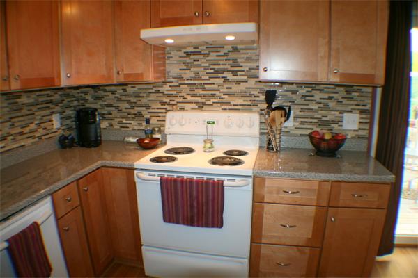 1 Fawn Ridge, Unit 1 Brookfield, CT 06804 - Photo 7 of 23 a kitchen with a sink stove and cabinets