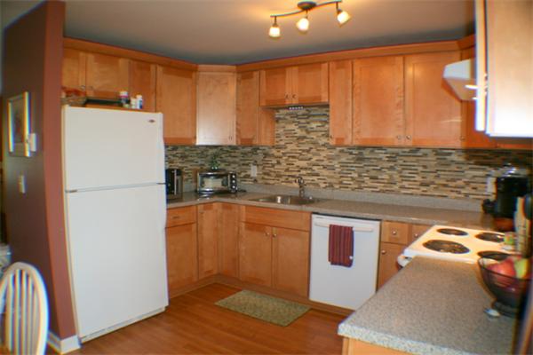 1 Fawn Ridge, Unit 1 Brookfield, CT 06804 - Photo 8 of 23 a kitchen with stainless steel appliances granite countertop a refrigerator and a sink