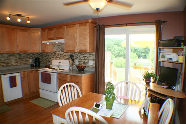 1 Fawn Ridge, Unit 1 Brookfield, CT 06804 - Photo 10 of 23 a kitchen with stainless steel appliances granite countertop a stove and a refrigerator