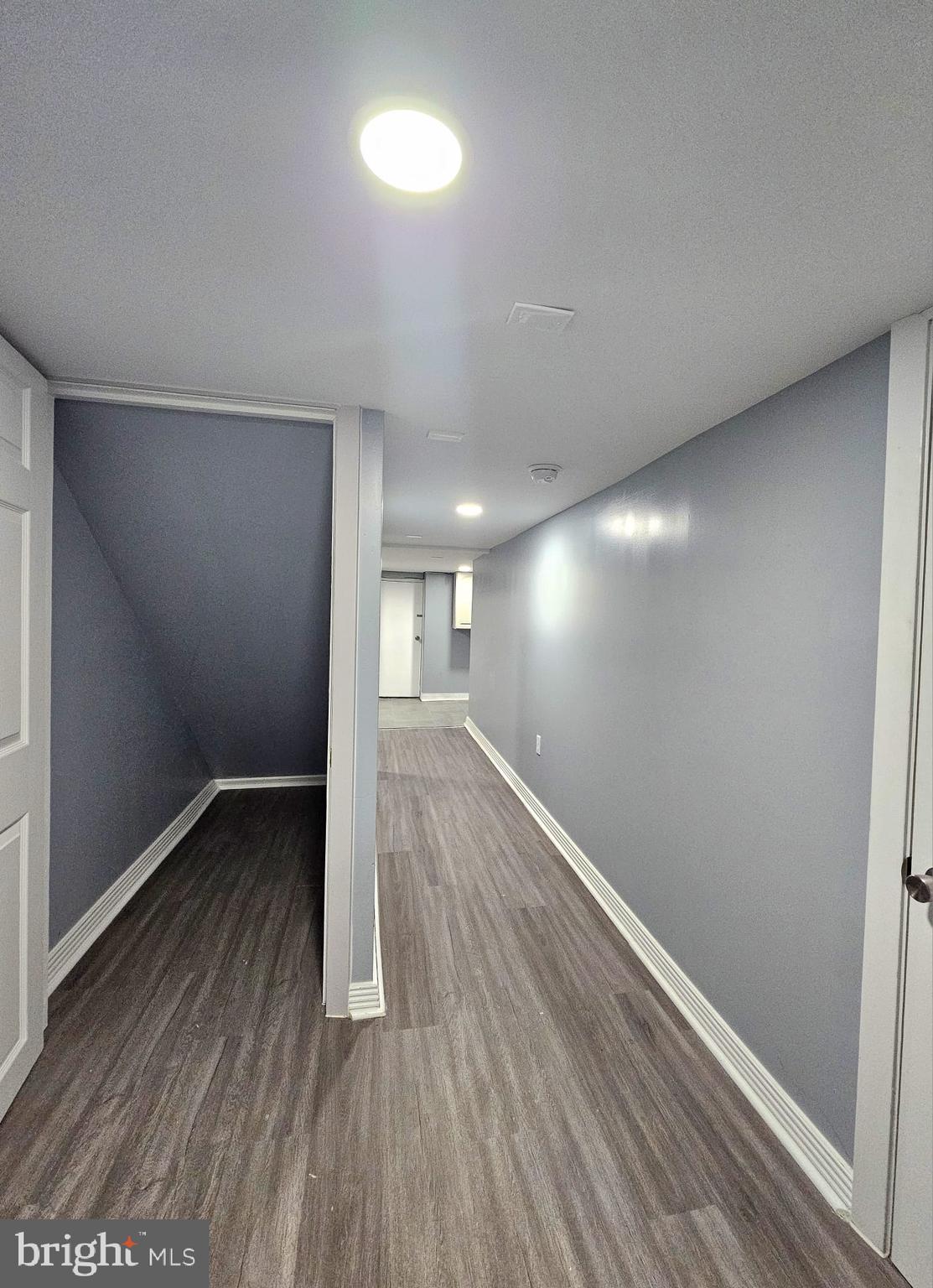 827 South 56th Street Philadelphia, PA 19143 - Photo 24 of 36 wooden floor in an empty room with a window