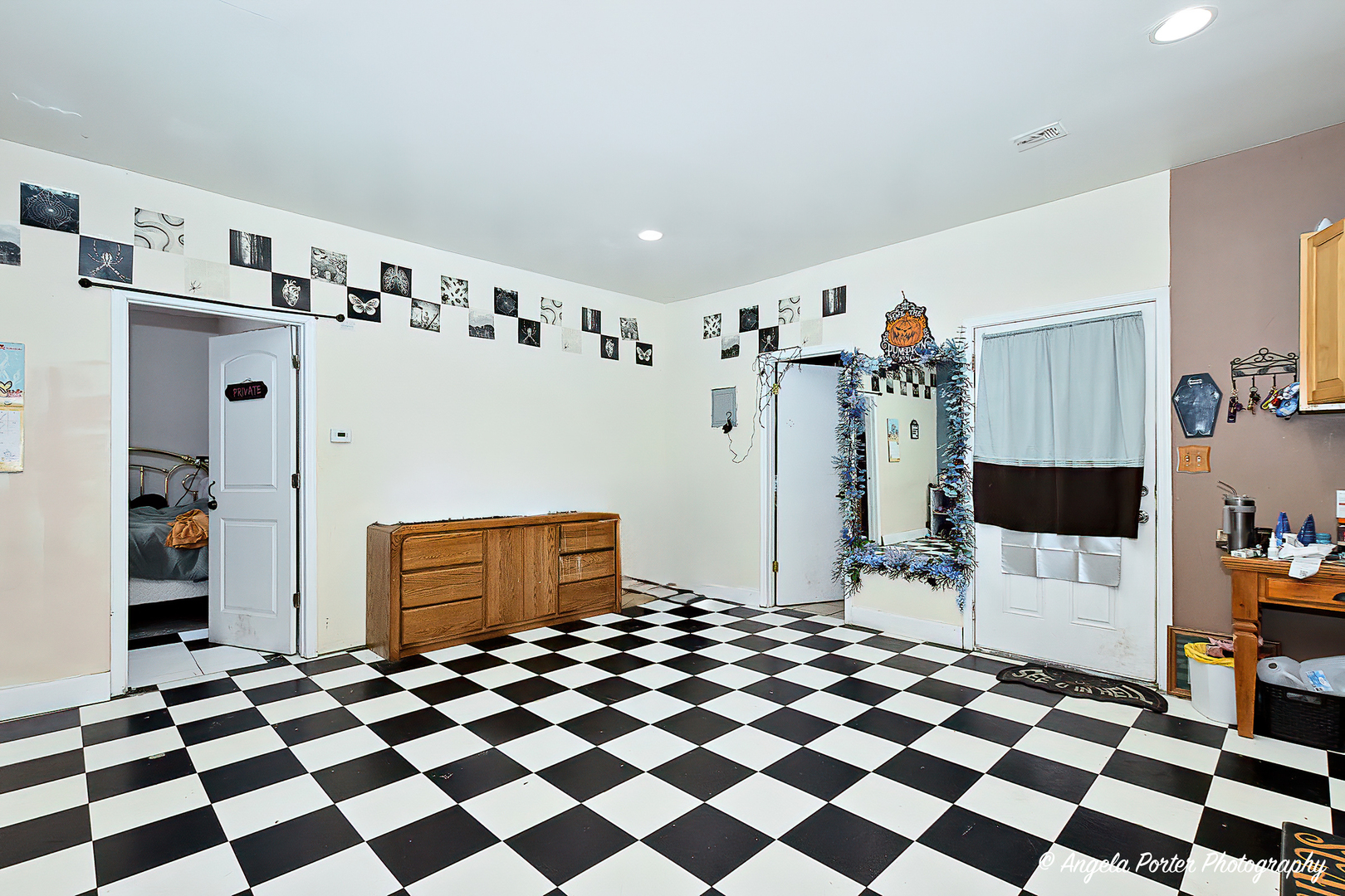 43 Lippincott Road Fox Lake, IL 60020 - Photo 24 of 31 a living room with a black white checkered floor