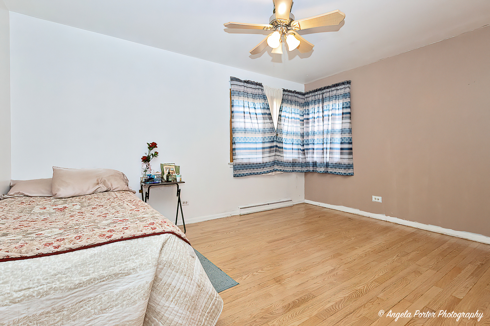 43 Lippincott Road Fox Lake, IL 60020 - Photo 8 of 31 a bedroom with a bed and a chandelier