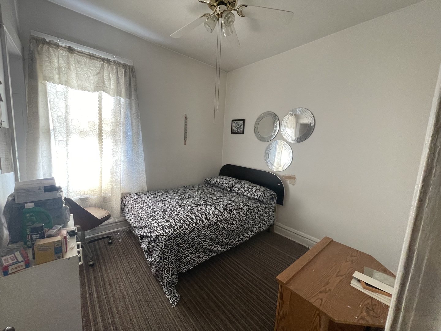 656 North Drake Avenue Chicago, IL 60624 - Photo 15 of 33 a bedroom with a bed and window