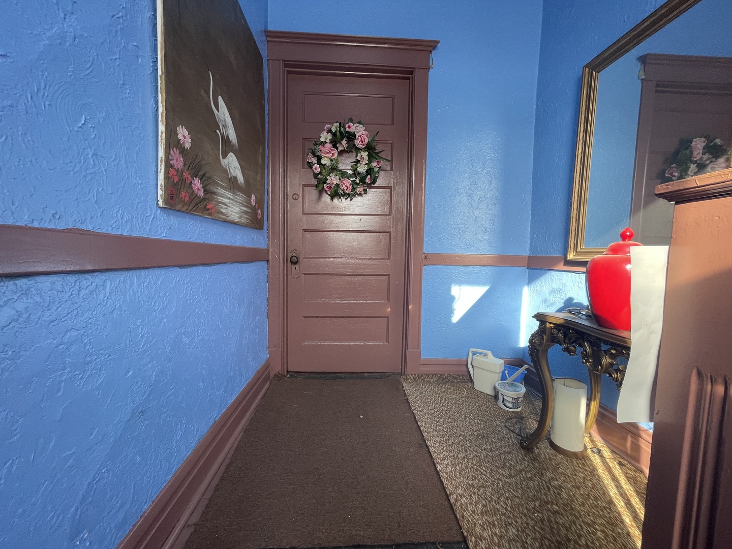 656 North Drake Avenue Chicago, IL 60624 - Photo 19 of 33 a view of a hallway to room with wooden floor and closet