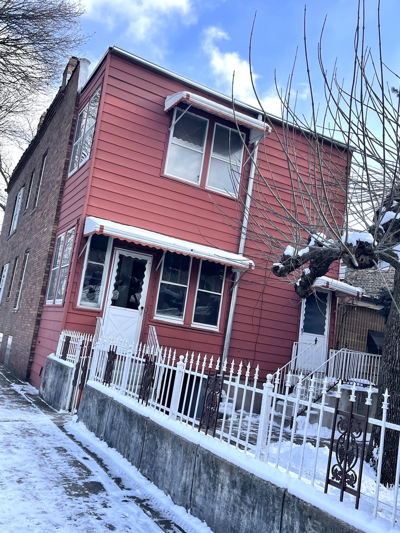 656 North Drake Avenue Chicago, IL 60624 - Photo 30 of 33 a front view of a house with balcony