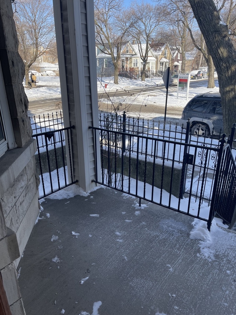 656 North Drake Avenue Chicago, IL 60624 - Photo 5 of 33 a view of a porch with a yard