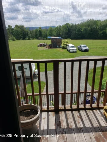 a view of a balcony with outdoor space