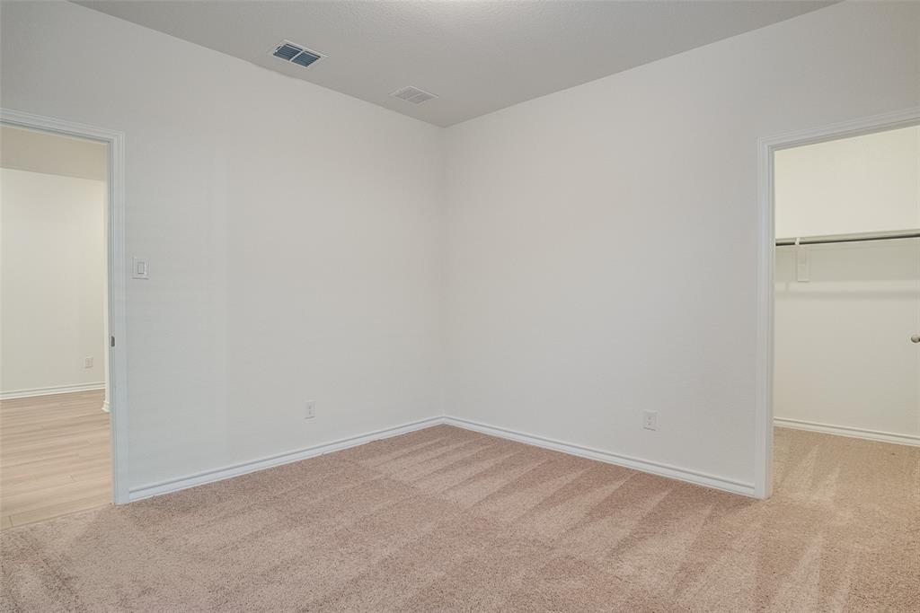 329 Fallbrook Drive Aledo, TX 76008 - Photo 17 of 33 a view of an empty room