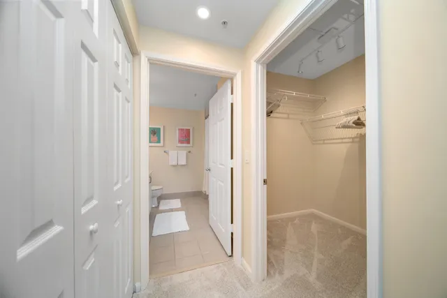 a bathroom with a glass shower door