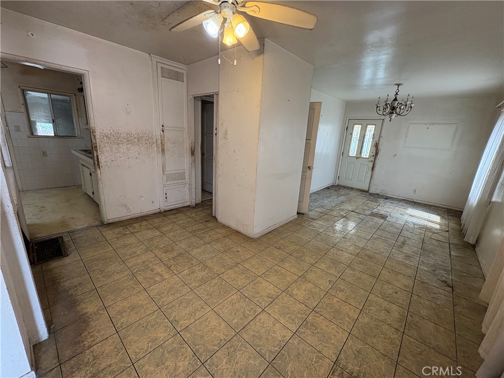 14023 Studebaker Road Norwalk, CA 90650 - Photo 6 of 33 a view of a livingroom with an empty space and a sink